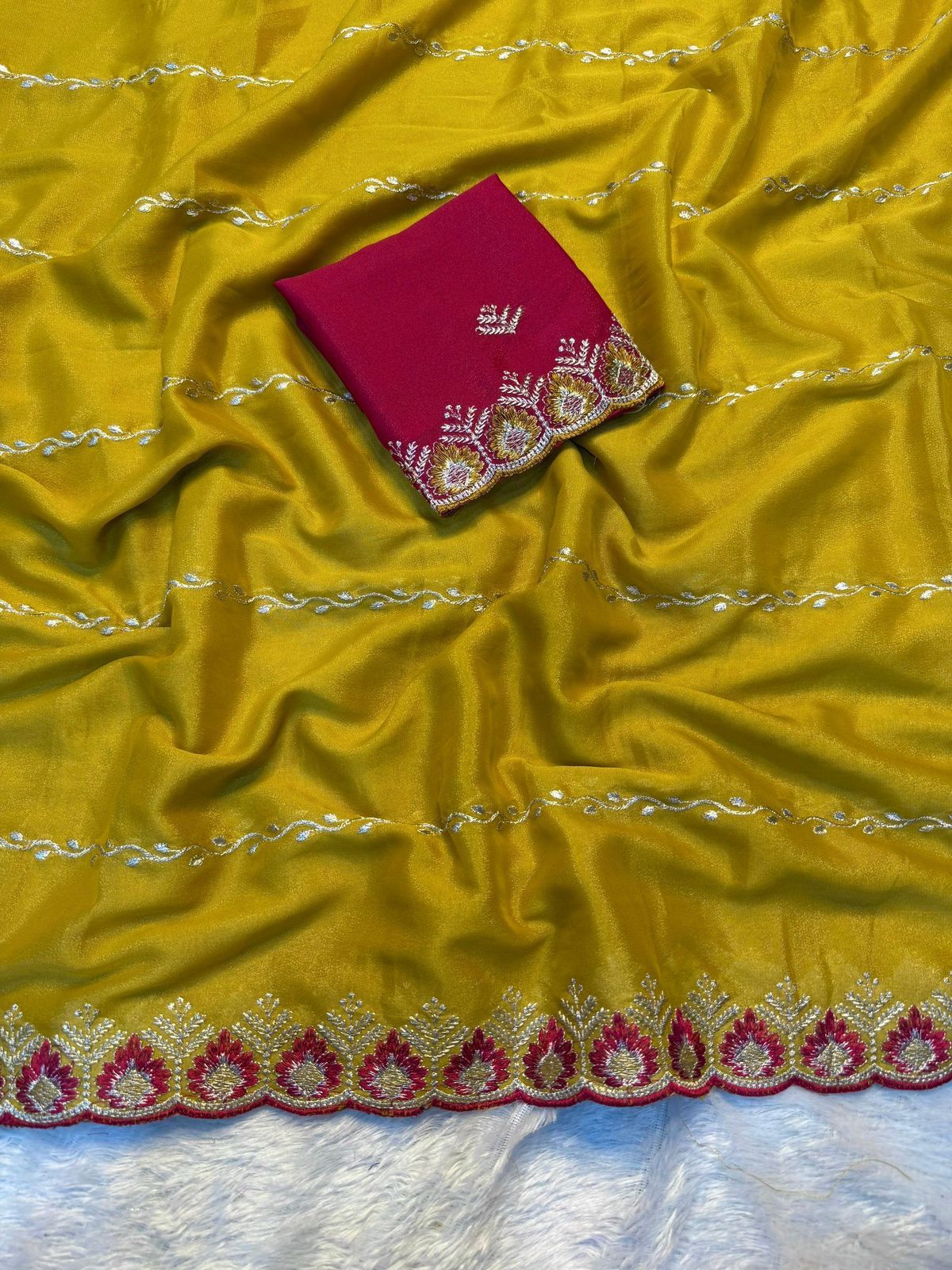 Ruhabs Festive Wear Beautiful Georgette Silk Saree With Embroidered Border And Blouse Piece